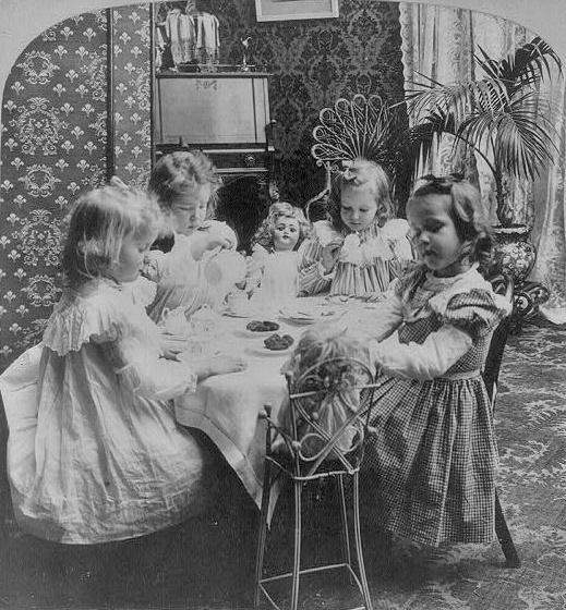 1920. old tea time party for little girls with their dolls