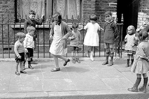 Vintage photo kids playing hopskotch