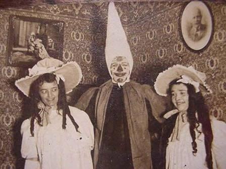 Halloween. Victorian era people in costumes.