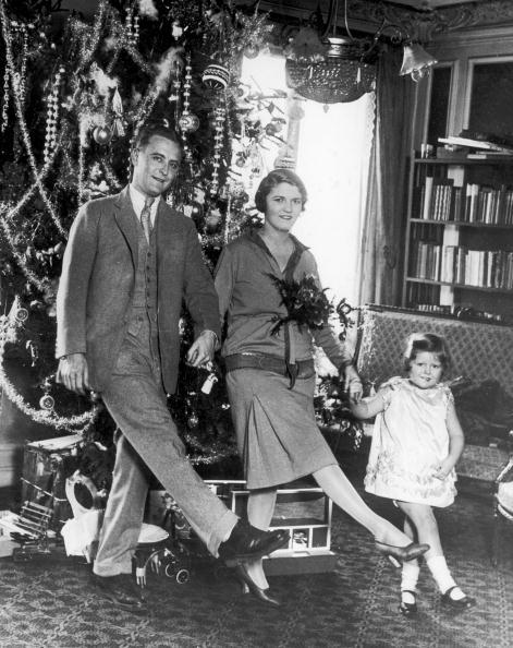 Scott Fitzgerald with his wife and daughter dancing