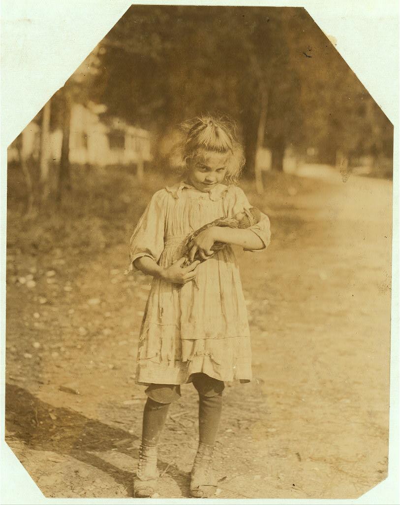 Girl with a doll 1913