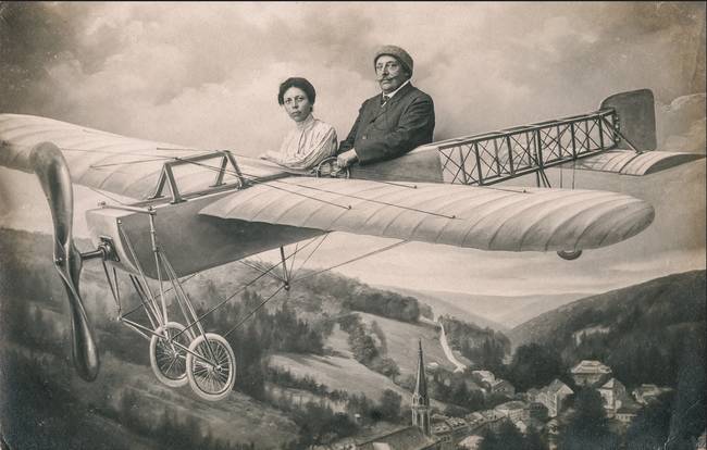 vintage staged photo of a pair in the plane