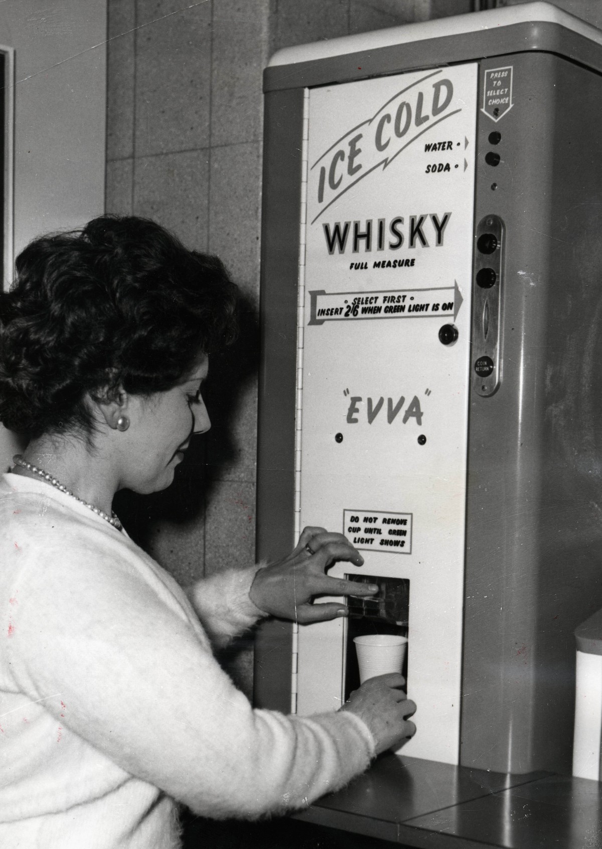 retro photo of an office whisky dispenser