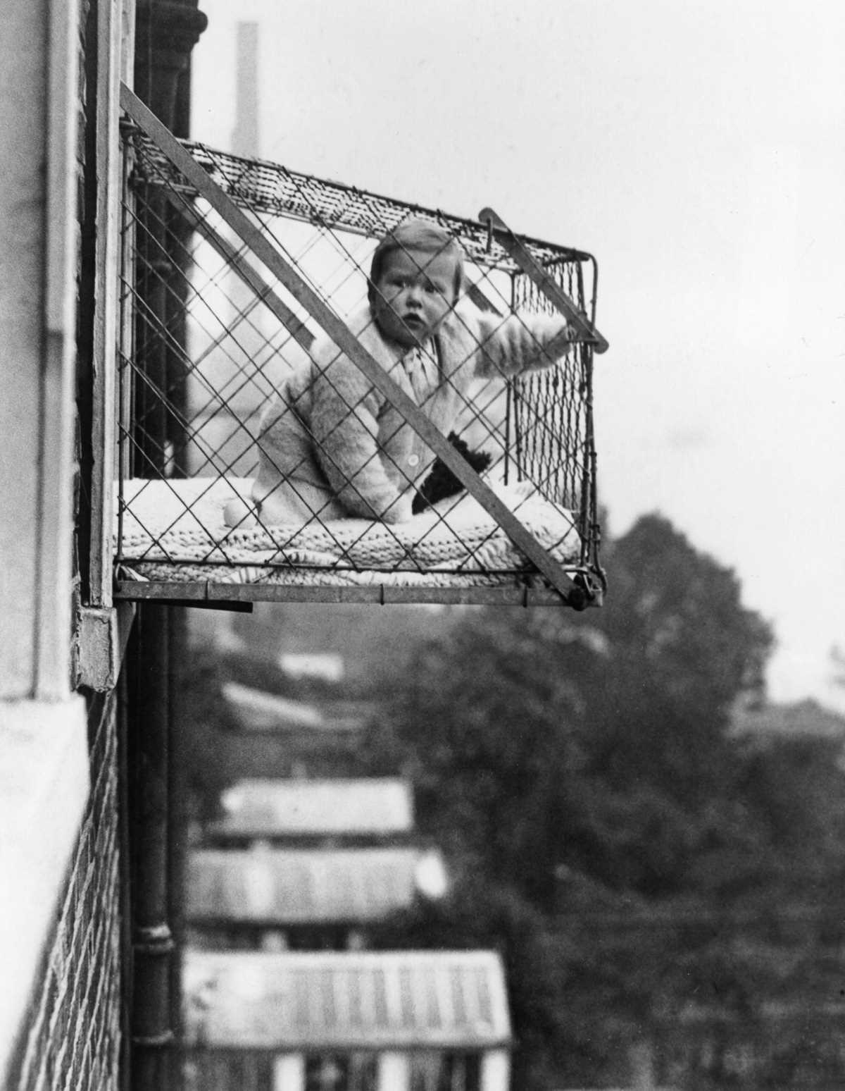 vintage photo of a baby cage