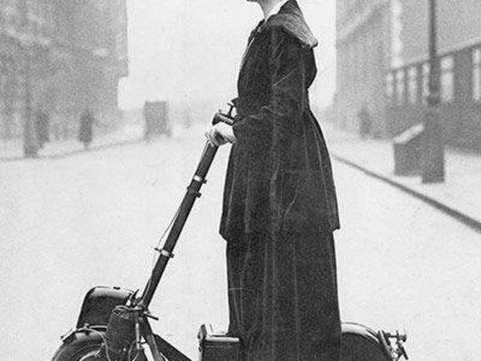 A woman riding an Autoped, New York, 1916