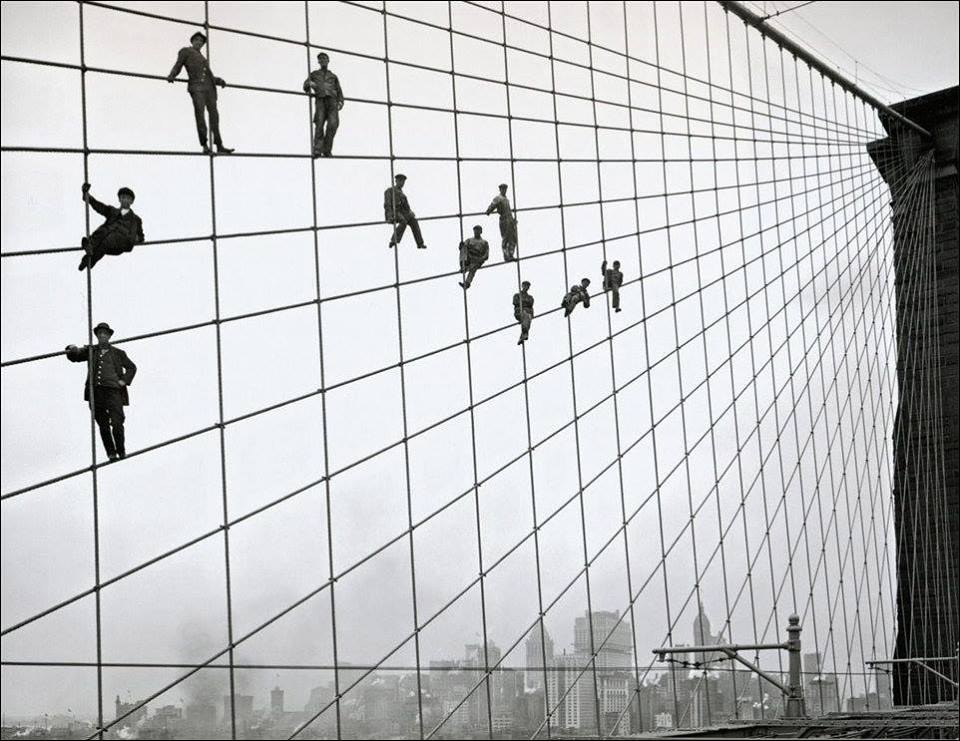 Workers on the cables of the Brooklyn Bridge, October 1914