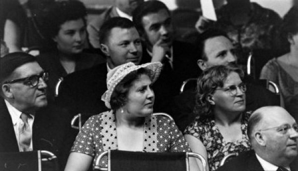 Soviet people are gazing at the Dior models during the Fashion show