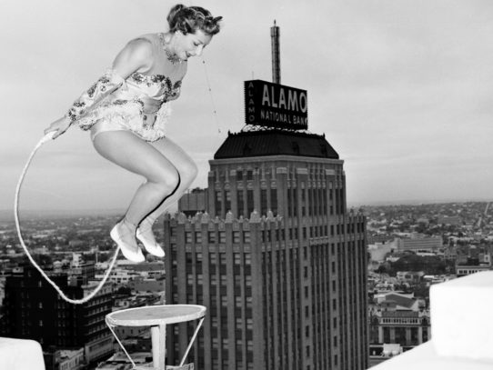Betty Fox skips rope on a ledge 400 feet above the street, 1958