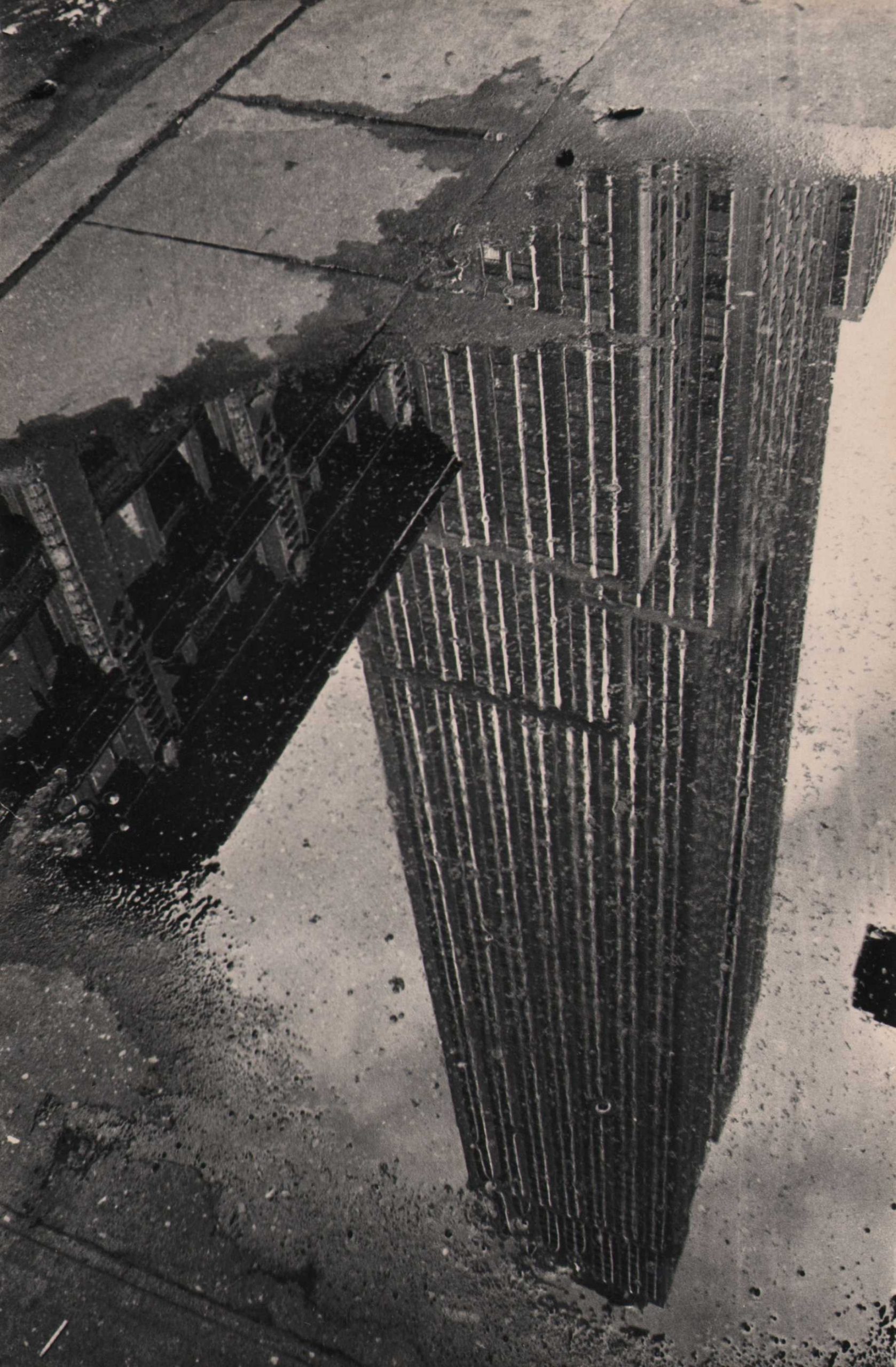 Fritz Neugass, Reflections- Empire State in a Rain Puddle, c. 1948