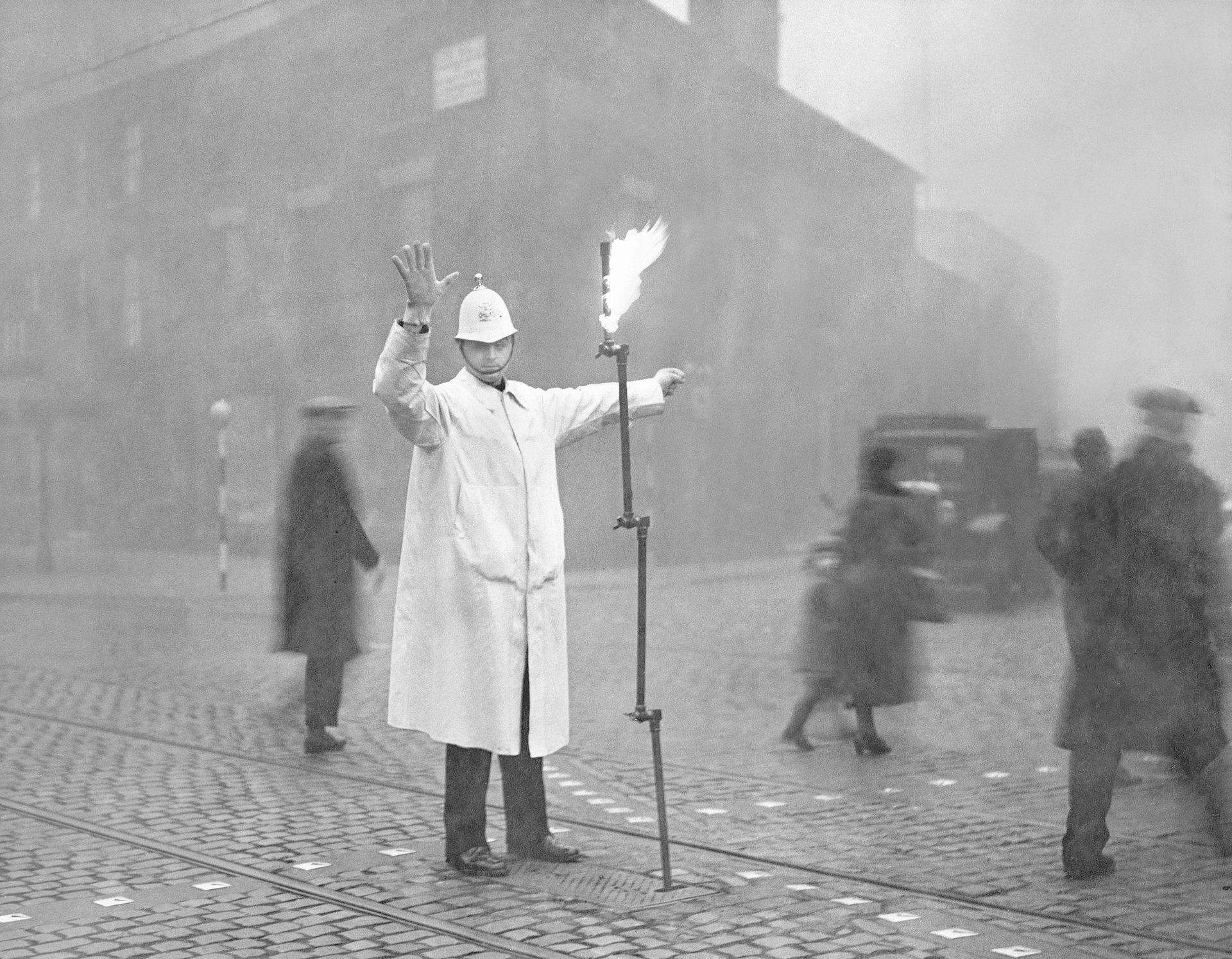 A street traffic police with a torch