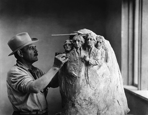 Gutzon Borglum is working with the model of Rushmore