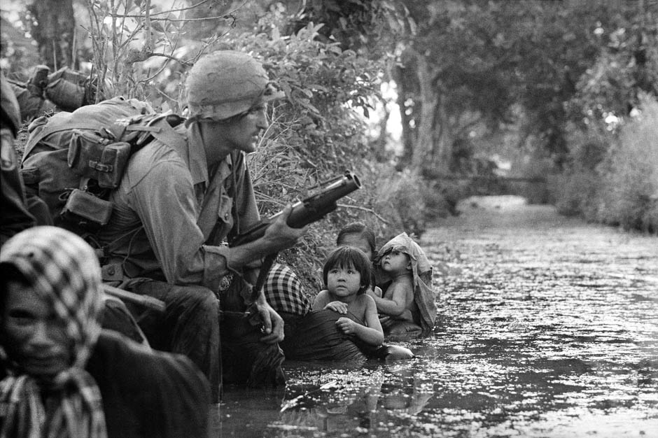 Famous picture of Vietnamese kids and US marine by Horst Faas