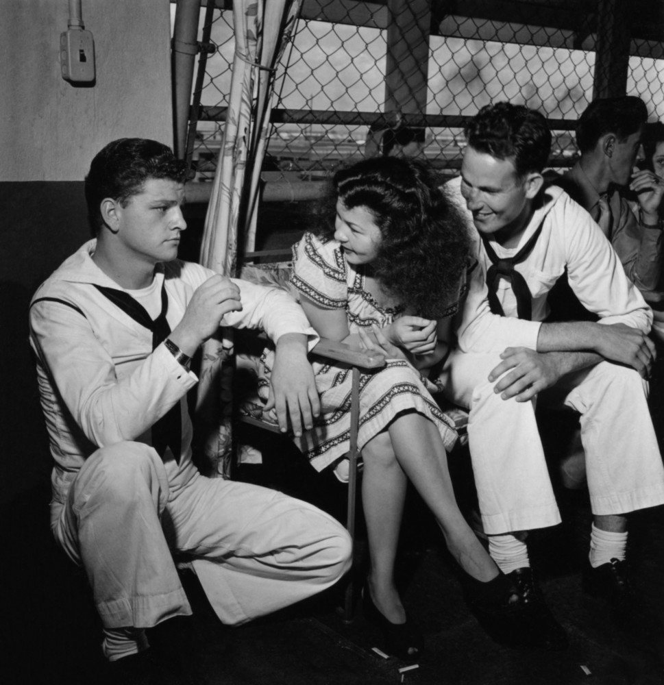 Pictures of Sailors with a local girl