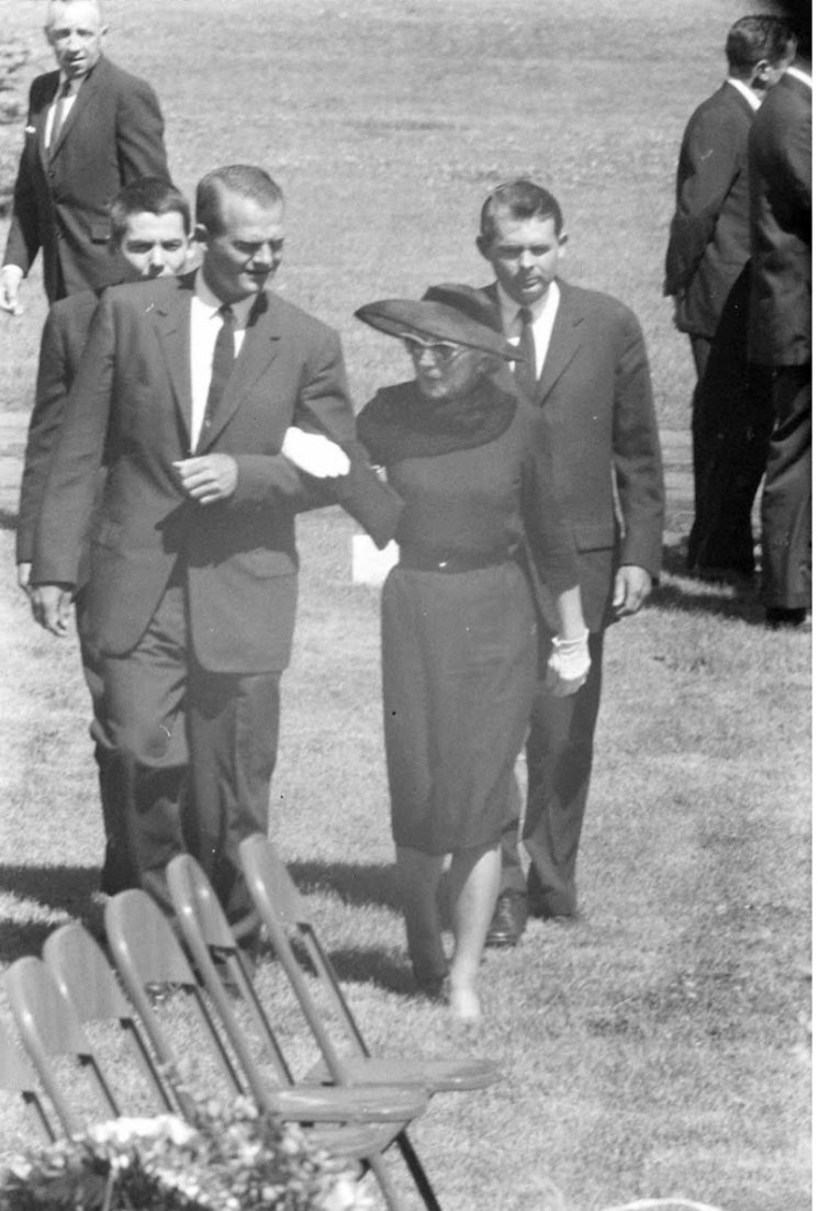 Mary Welsh Hemingway walks towards husband's coffin